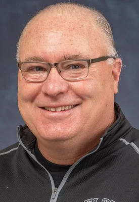 Head and shoulders photo man with glasses