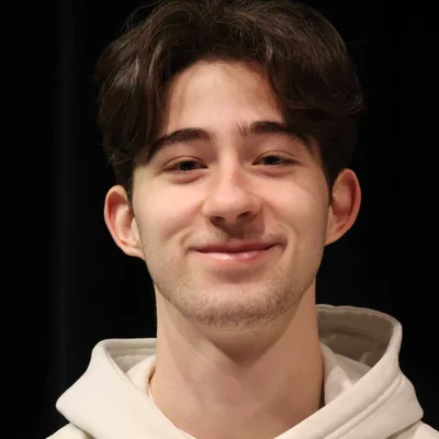 Head and shoulders of a young man with brown hair
