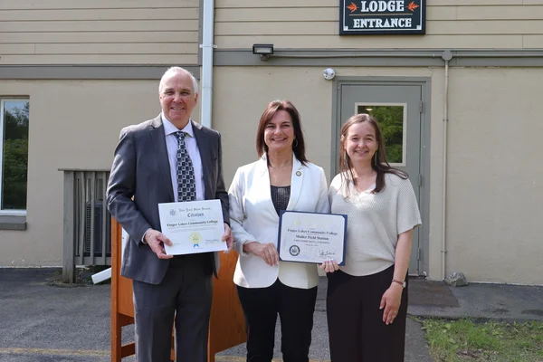 Three individuals posed for a photo at the 2025 Muller Field Station Groundbreaking.